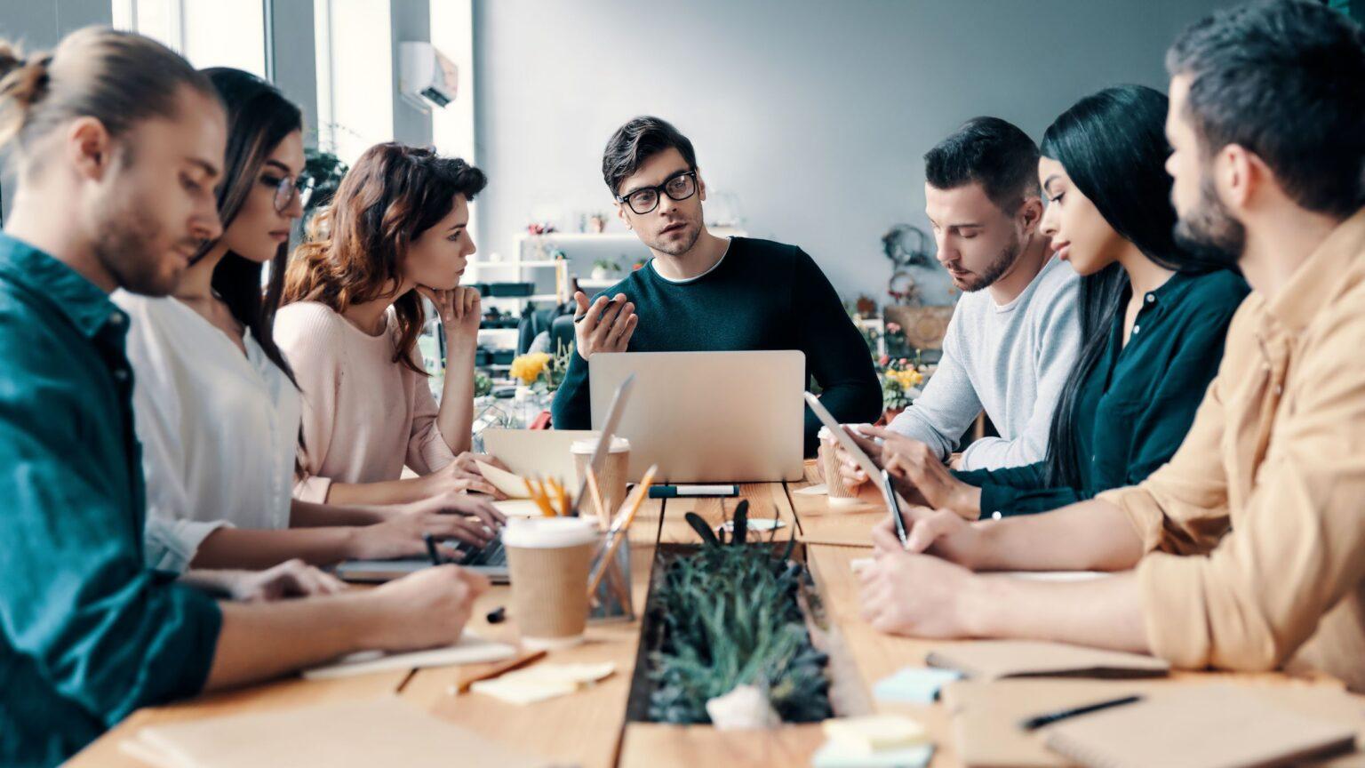 JMO Marketing leadership team in collaborative meeting